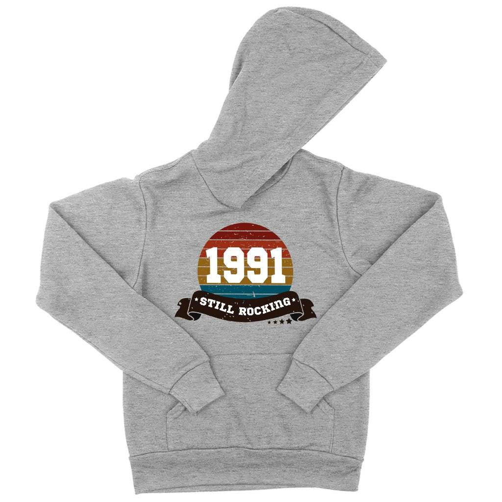 64484-08ae08.jpeg Kids' Sponge Fleece 1991 Still Rocking Hoodie - 1991 Hoodie - 1991 Clothing Kids & Baby Kids' Clothing Color : Athletic Heather|Black|Military Green