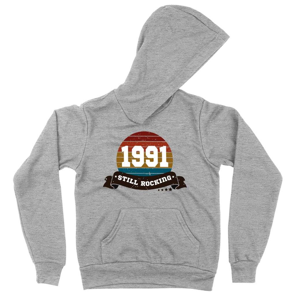 64484-d83981.jpeg Kids' Sponge Fleece 1991 Still Rocking Hoodie - 1991 Hoodie - 1991 Clothing Kids & Baby Kids' Clothing Color : Athletic Heather|Black|Military Green